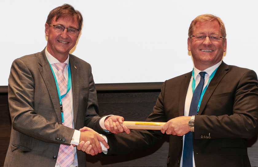 Jorodd Asphjell (at right) takes the baton from outgoing BSPC President Jørgen Pettersson of Åland. Photo: Ralf Roletschek.